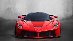 Front View of Red Ferrari LaFerrari Hypercar on Concrete Background HD wallpaper