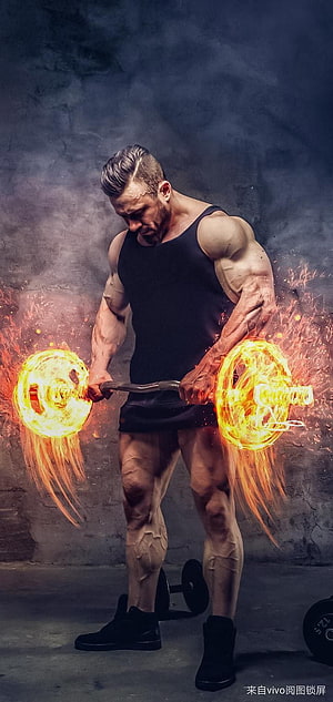 Muscular Bodybuilder Lifting Fiery Barbell with Intense Flame Effects HD phone wallpaper
