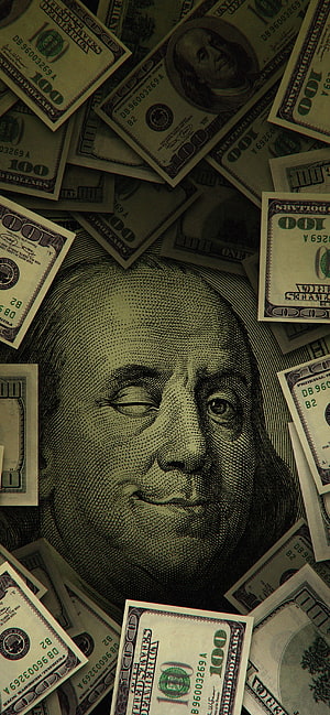 Benjamin Franklin Winking on a Hundred Dollar Bill Surrounded by Cash HD phone wallpaper