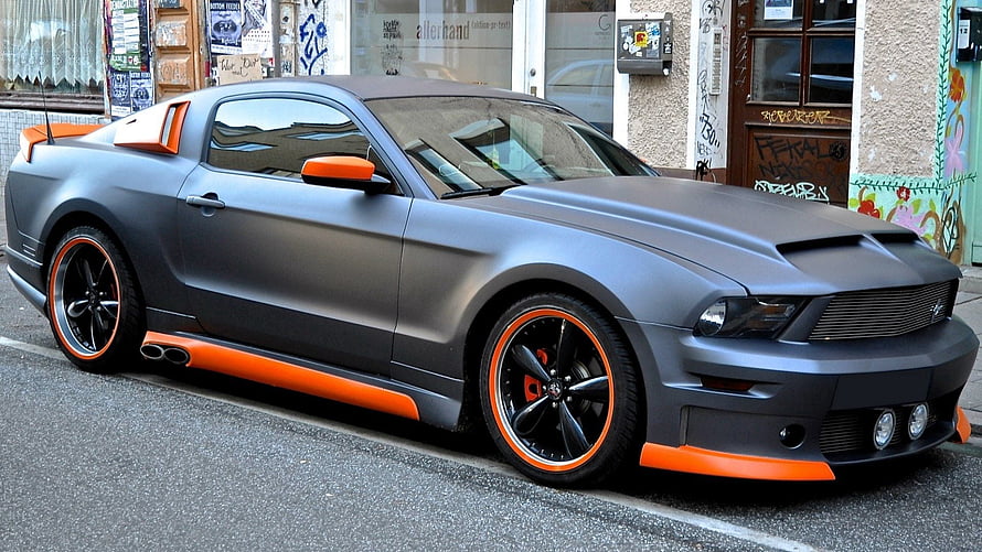 Custom Matte Grey Ford Mustang with Vibrant Orange Accents and Black Alloy Wheels HD wallpaper