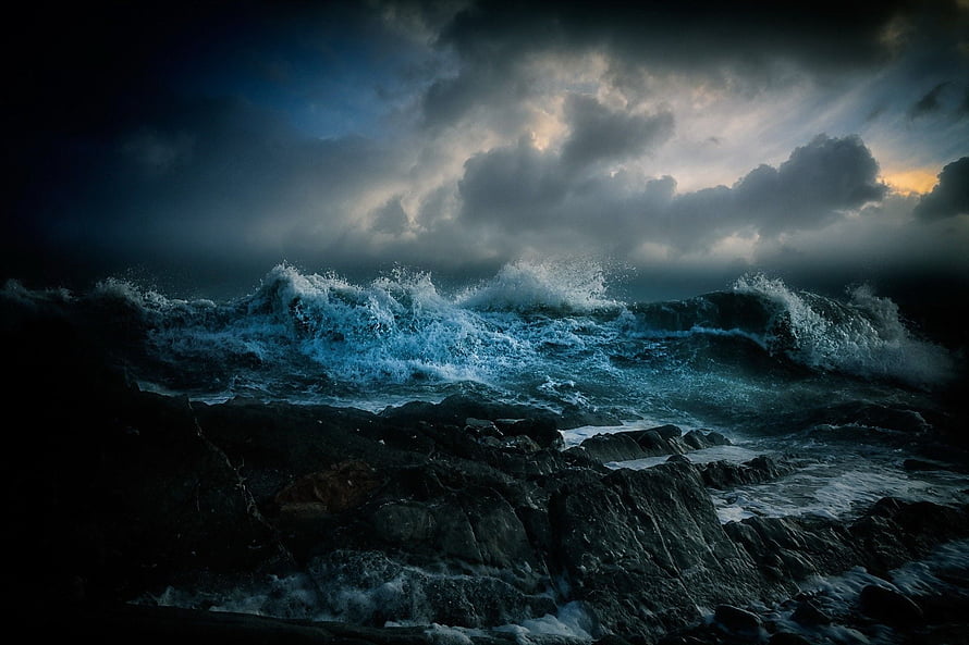 Dark Stormy Ocean Waves Crashing Against Rocky Coastline Under Dramatic Clouds HD wallpaper