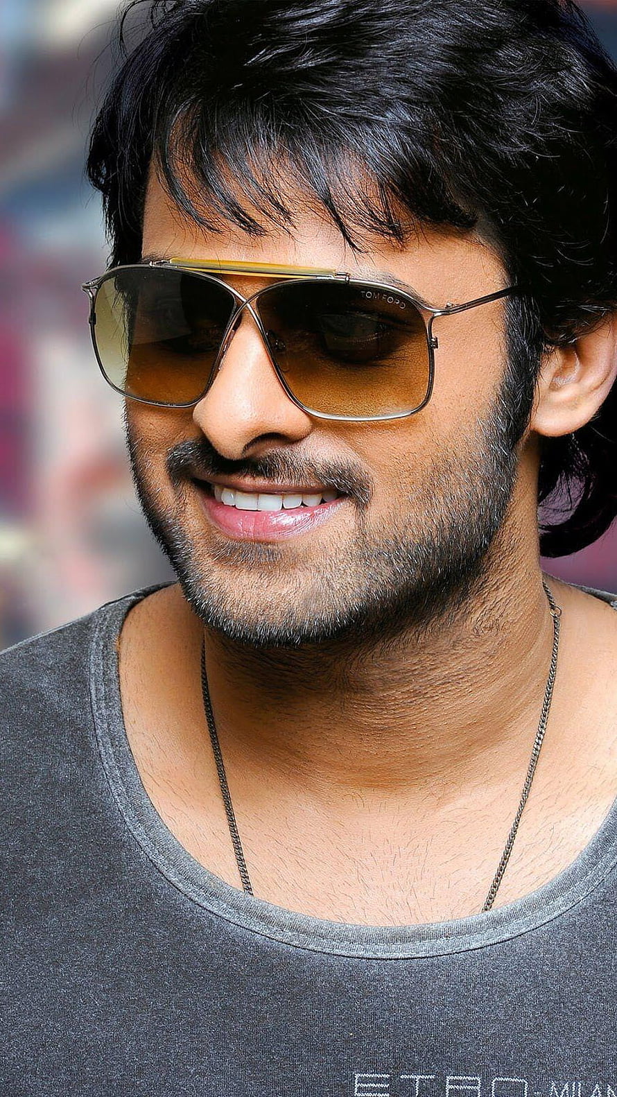 Stylish Portrait of Actor Prabhas Wearing Sunglasses and a Grey T-Shirt HD phone wallpaper