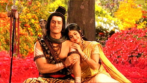 Shiva and Parvati sitting together in a vibrant garden with flowers HD wallpaper