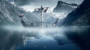 Viking Longship Navigating Misty Fjord with Snow-Capped Mountains HD wallpaper