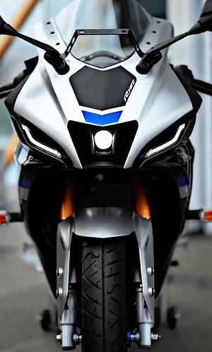 Front View of White Yamaha R150 Motorcycle with Blue Accents HD phone wallpaper