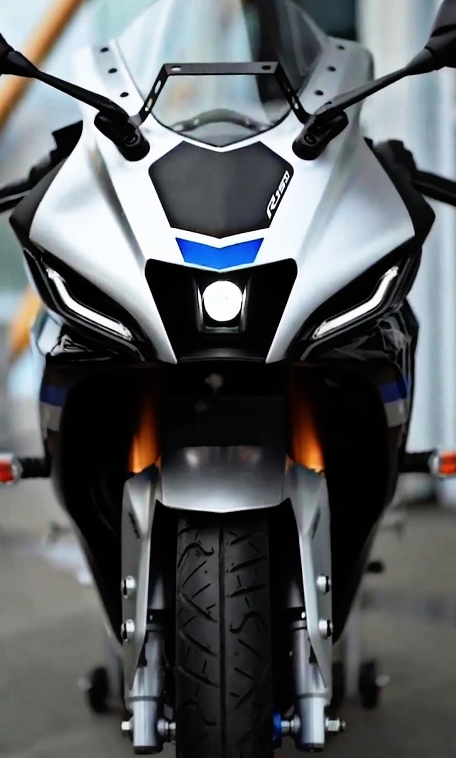 Front View of White Yamaha R150 Motorcycle with Blue Accents HD phone wallpaper