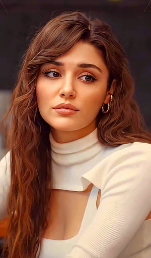 Portrait of a woman with long wavy brown hair wearing a white turtleneck top and gold hoop earrings, Hande ercel, Turkish actress HD phone wallpaper