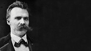Friedrich Nietzsche Vintage Portrait with Distinctive Mustache and Formal Attire HD wallpaper