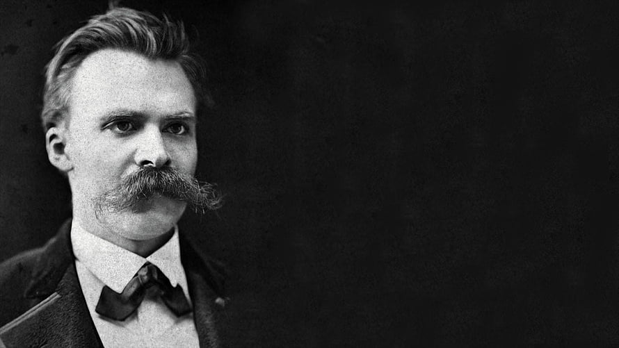 Friedrich Nietzsche Vintage Portrait with Distinctive Mustache and Formal Attire HD wallpaper