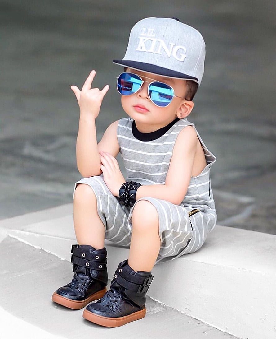 Stylish Toddler Boy Wearing Sunglasses and Cap in Striped Outfit HD phone wallpaper