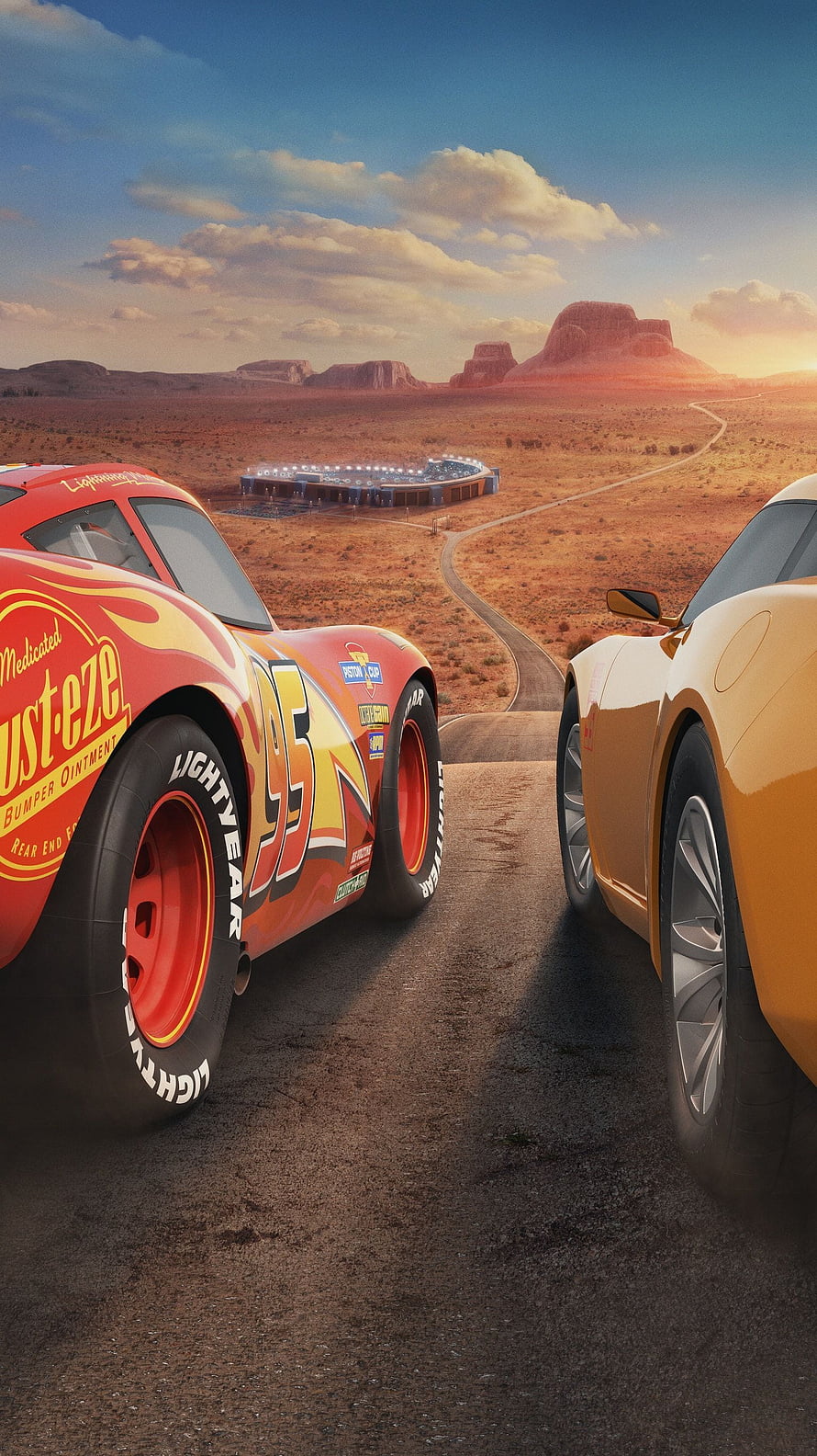 Cars 3 Lightning McQueen and Jackson Storm Racing in the Desert at Sunset HD phone wallpaper