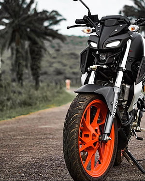 Yamaha MT-15 Motorcycle with Orange Wheels on a Rural Road HD phone wallpaper
