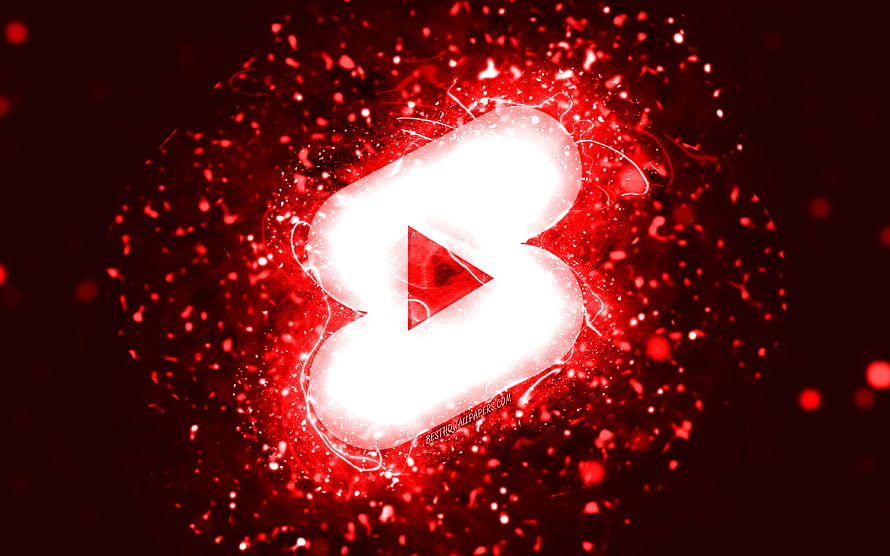 Glowing White Bluetooth Symbol Surrounded by Red Sparkles and Particles on Dark Background HD wallpaper