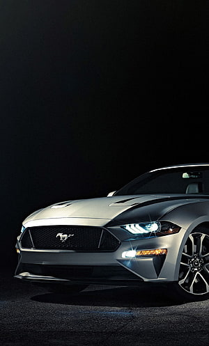 Silver Ford Mustang GT Front Three-Quarter View with LED Headlights on Dark Background HD phone wallpaper