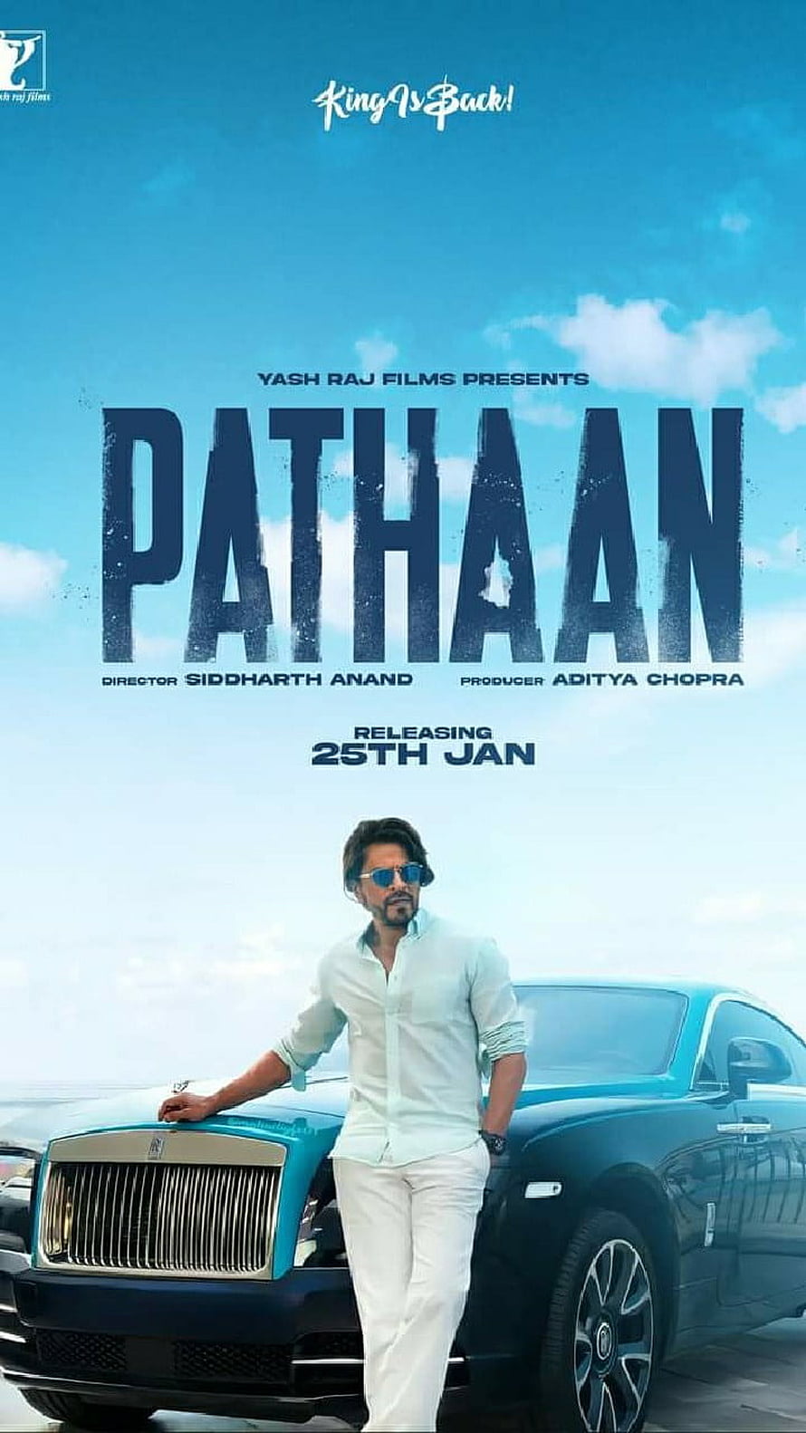 Pathaan Movie Poster Featuring Shah Rukh Khan Leaning on a Luxury Car HD phone wallpaper