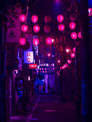 Neon-lit Japanese alleyway at night with glowing red lanterns and vibrant purple street atmosphere HD phone wallpaper