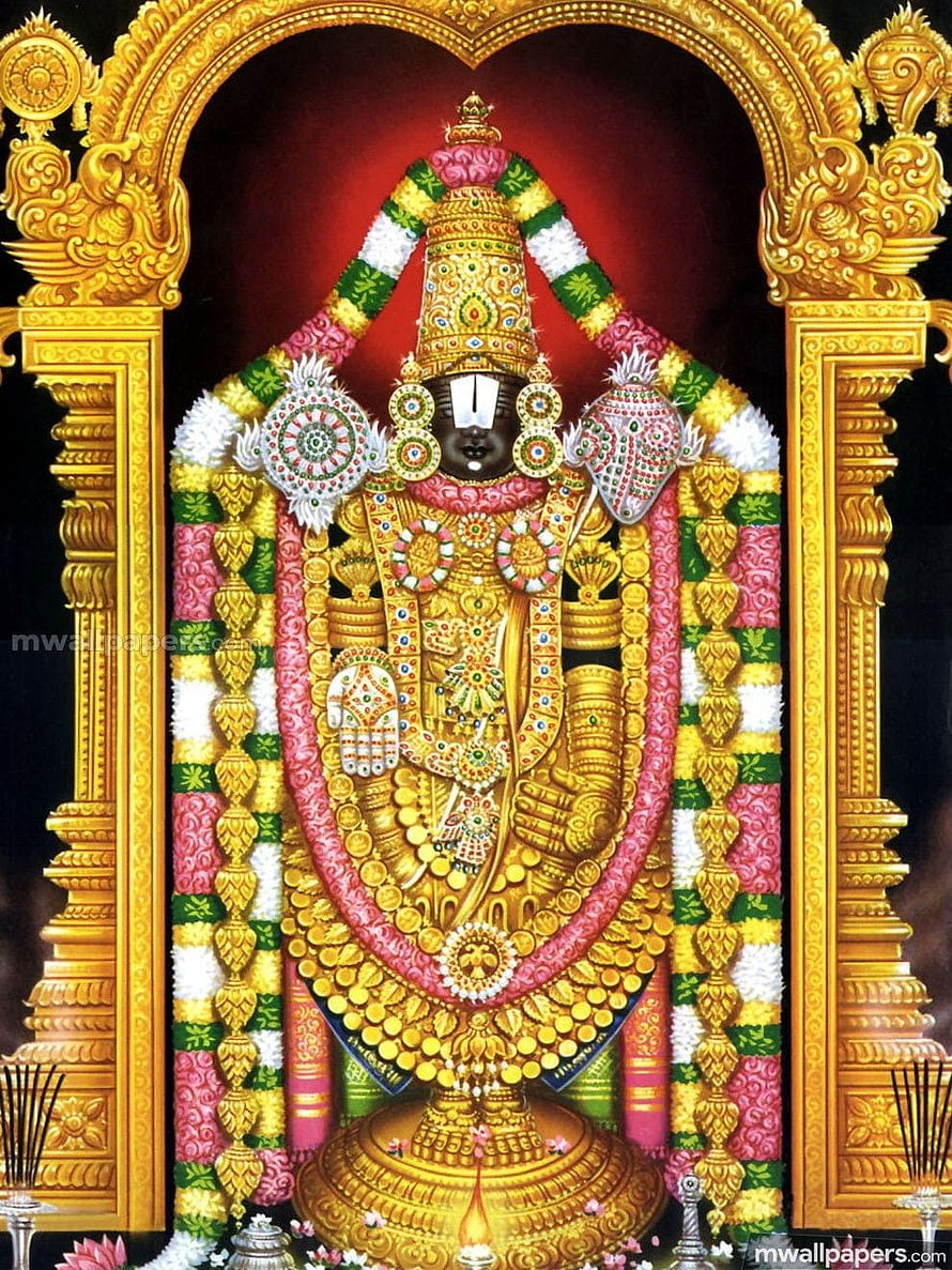 Lord Perumal adorned in golden ornaments and vibrant flower garlands within a temple arch HD phone wallpaper