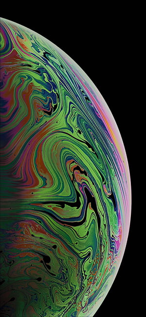 Vibrant Swirling Liquid Marble Sphere on Black Background HD phone wallpaper