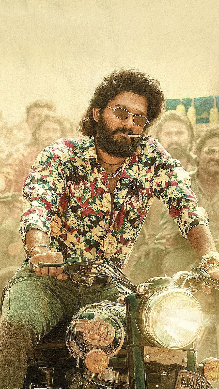Allu Arjun as Pushpa Riding a Royal Enfield Motorcycle in a Vibrant Floral Shirt HD phone wallpaper