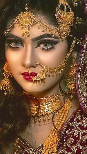Stunning Portrait of a Bride in Traditional Indian Bridal Jewelry and Maroon Attire HD phone wallpaper