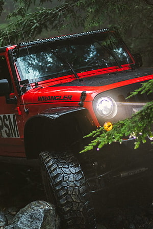 Red Jeep Wrangler Off-Road Adventure in Dense Forest Terrain HD phone wallpaper