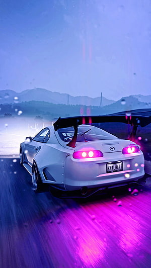 White Toyota Supra with Large Rear Wing Driving on Wet Road at Night with Purple Neon Glow HD phone wallpaper