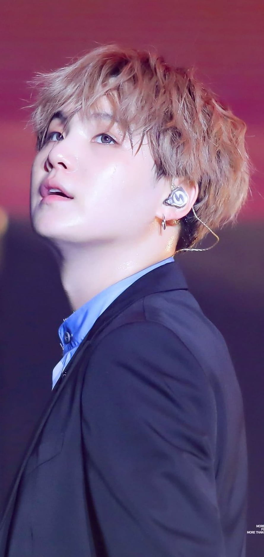 BTS Suga in a black suit with blue shirt and stage in-ear monitor HD phone wallpaper