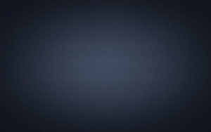 Minimalist Dark Grey Gradient Background with Subtle Matte Texture and Soft Vignette HD wallpaper