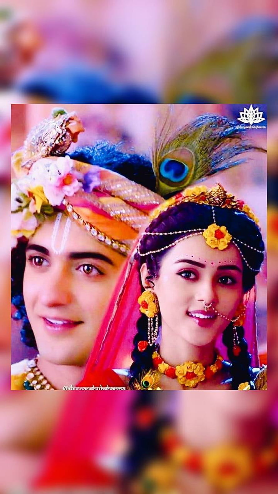Krishna and Radha in traditional attire with peacock feather crown and floral jewelry HD phone wallpaper