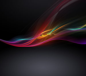 Vibrant Multicolored Abstract Light Streaks Flowing Across Dark Background HD wallpaper