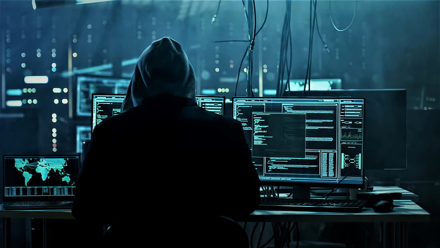 Anonymous Hacker in Hoodie Working on Multiple Monitors with Code and Data HD wallpaper