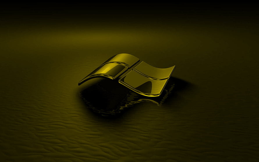 Golden Windows Logo Floating on Dark Water Surface HD wallpaper