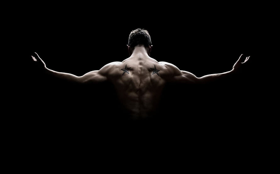 Muscular Male Back With Star Tattoos Against Black Background HD wallpaper