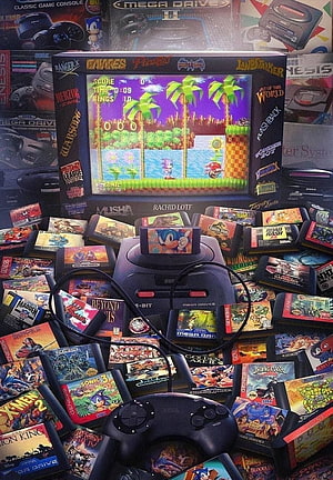 Sega Genesis Console Surrounded by Classic Game Cartridges and Retro Gaming Artwork HD phone wallpaper