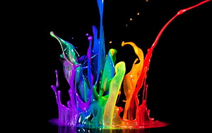 Vibrant Rainbow Paint Splash on Black Background HD wallpaper