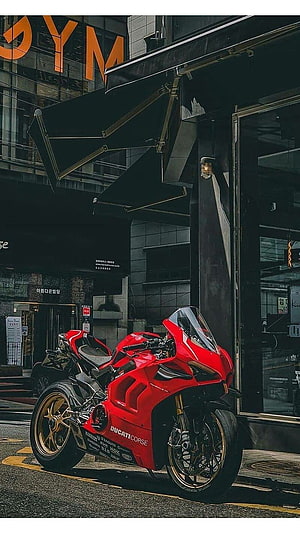 Red Ducati Panigale V4 Sportbike Parked on Urban Street with Gold Wheels HD phone wallpaper