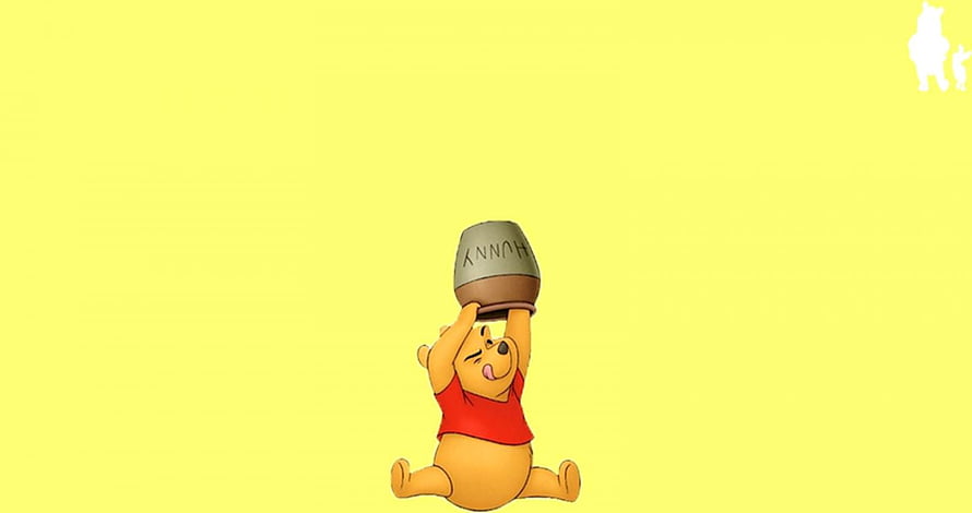 Winnie the Pooh lifting a honey pot against a bright yellow background HD wallpaper