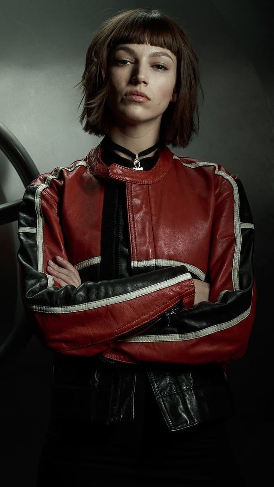 Ursula Corbero as Tokyo in Money Heist wearing a red and black leather jacket with arms crossed HD phone wallpaper