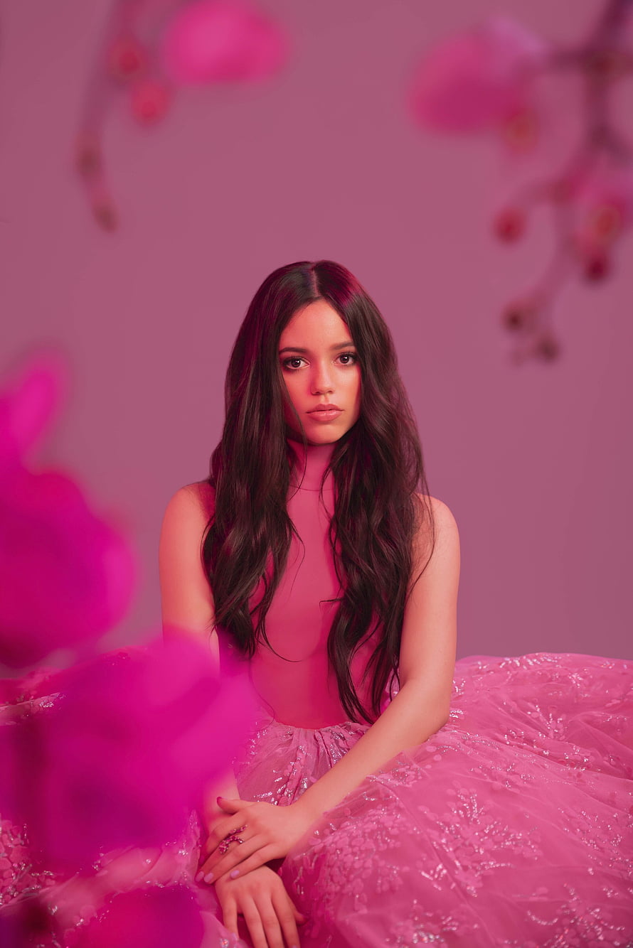 Isabella Merced in a Pink Gown with Floral Background HD phone wallpaper