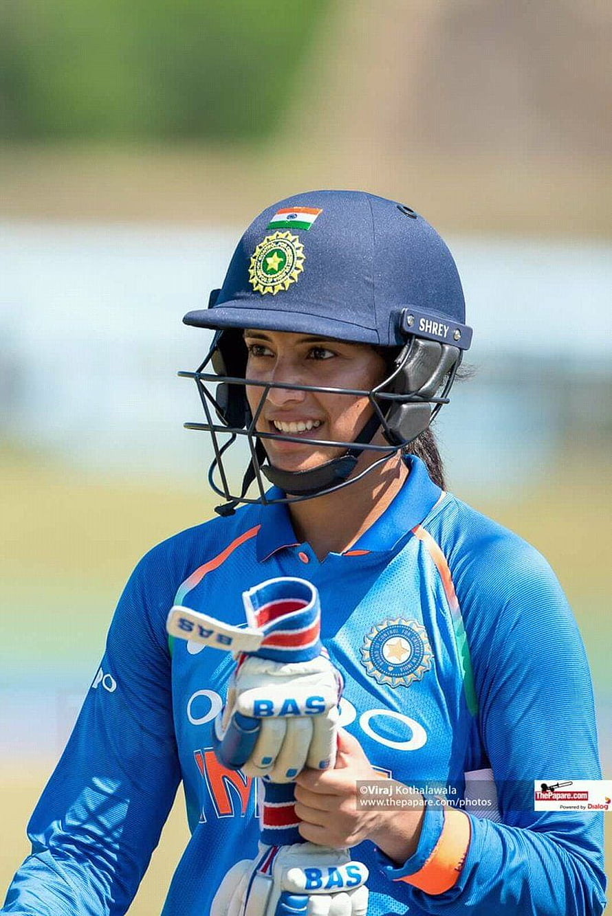 Smriti Mandhana in Indian Cricket Team Blue Jersey and Helmet HD phone wallpaper
