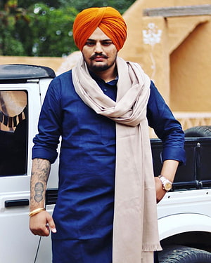 Man in Blue Kurta and Orange Turban with Beige Scarf Standing by White Jeep, Sidhu Moose Wala HD phone wallpaper