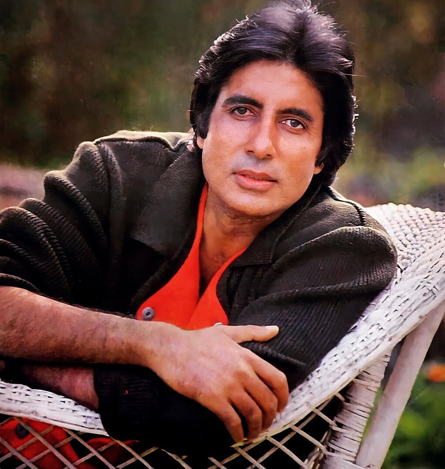 Amitabh Bachchan Portrait in Dark Jacket and Red Shirt Seated on Wicker Chair HD phone wallpaper