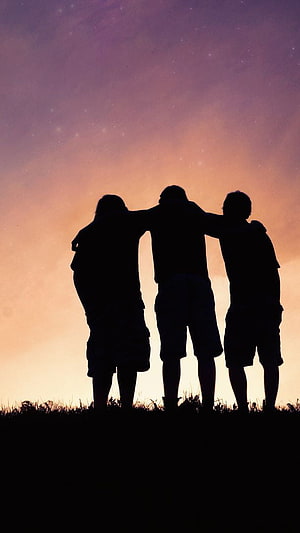 Silhouette of Three Friends Standing Together at Sunset HD phone wallpaper