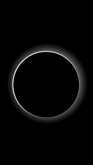 Minimalist Black Circle with White Glowing Ring on Dark Background HD phone wallpaper
