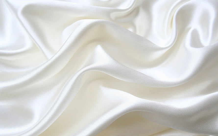 Flowing White Satin Fabric with Soft Folds and Lustrous Sheen HD wallpaper