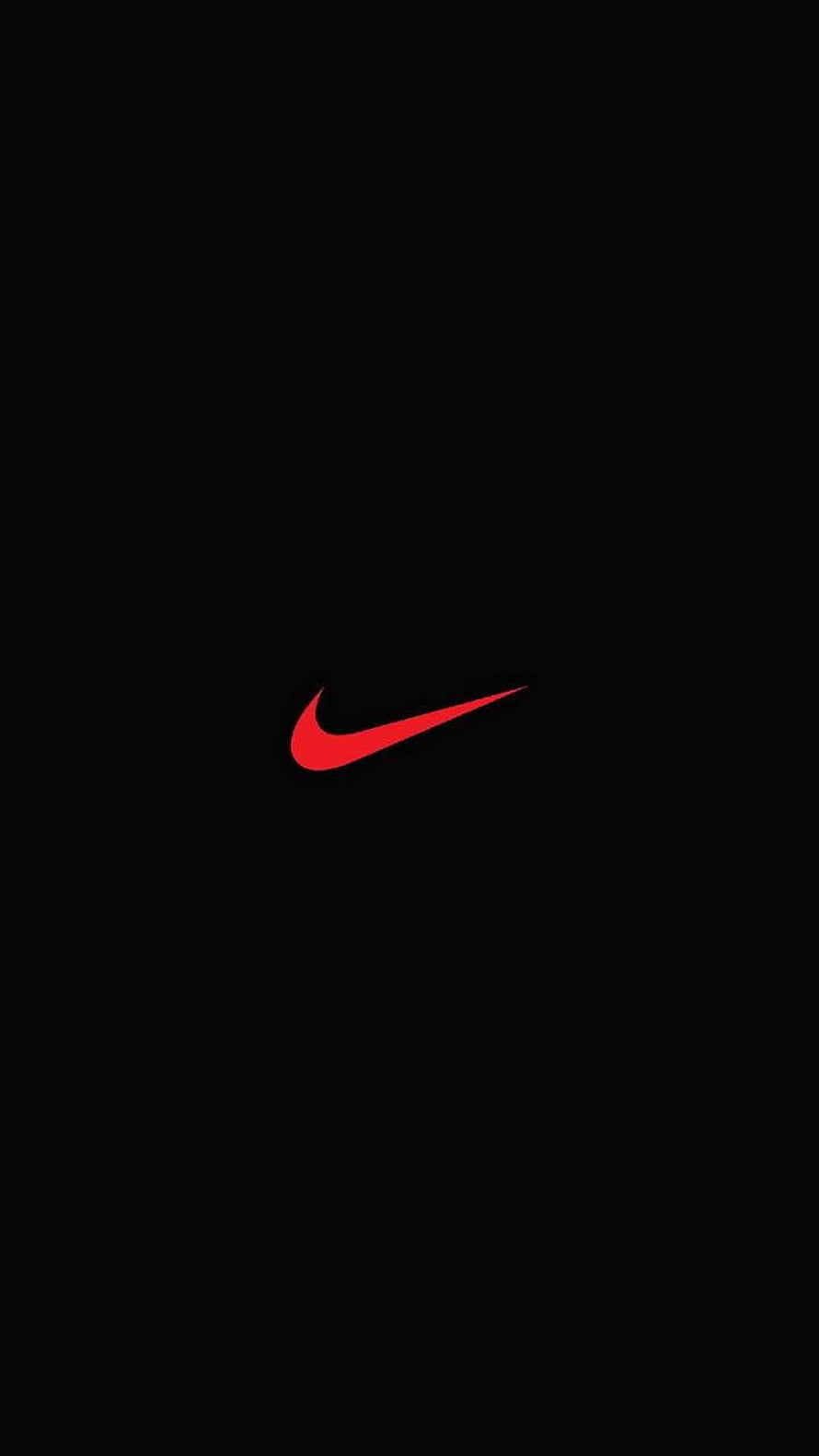 Minimalist Nike Swoosh Logo in Vibrant Red on a Solid Black Background HD phone wallpaper