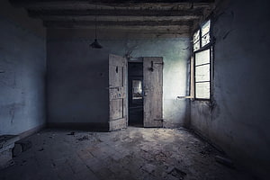 Abandoned Interior With Peeling Walls And Broken Wooden Doors HD wallpaper