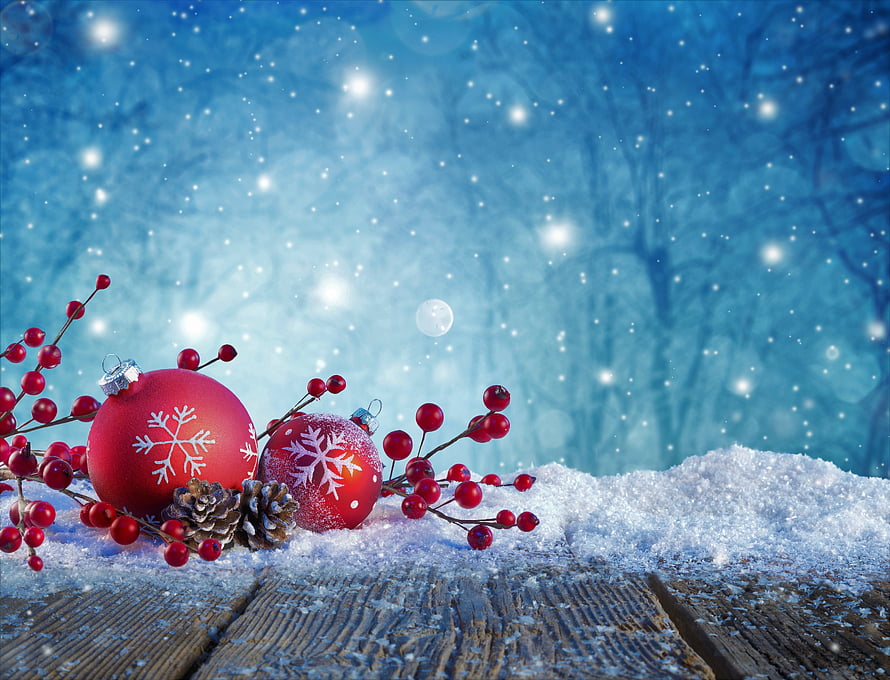 Festive Christmas Ornaments with Red Berries and Pinecones on Snowy Wood HD wallpaper