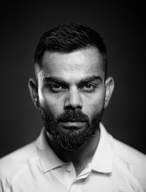 Virat Kohli Black and White Portrait with Intense Gaze and Full Beard HD phone wallpaper