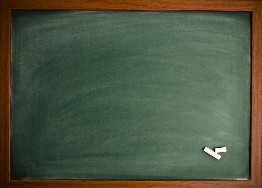 Empty Green Chalkboard with Wooden Frame and Chalk Pieces HD wallpaper